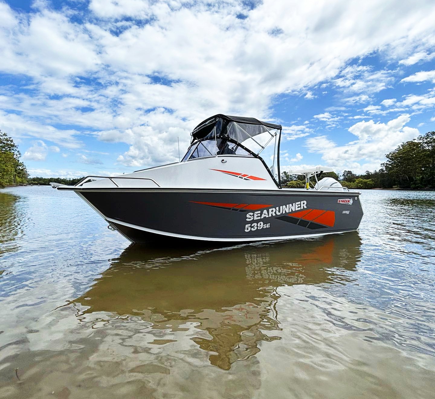 Stacer Sea Runner on a shallow part of a lake.