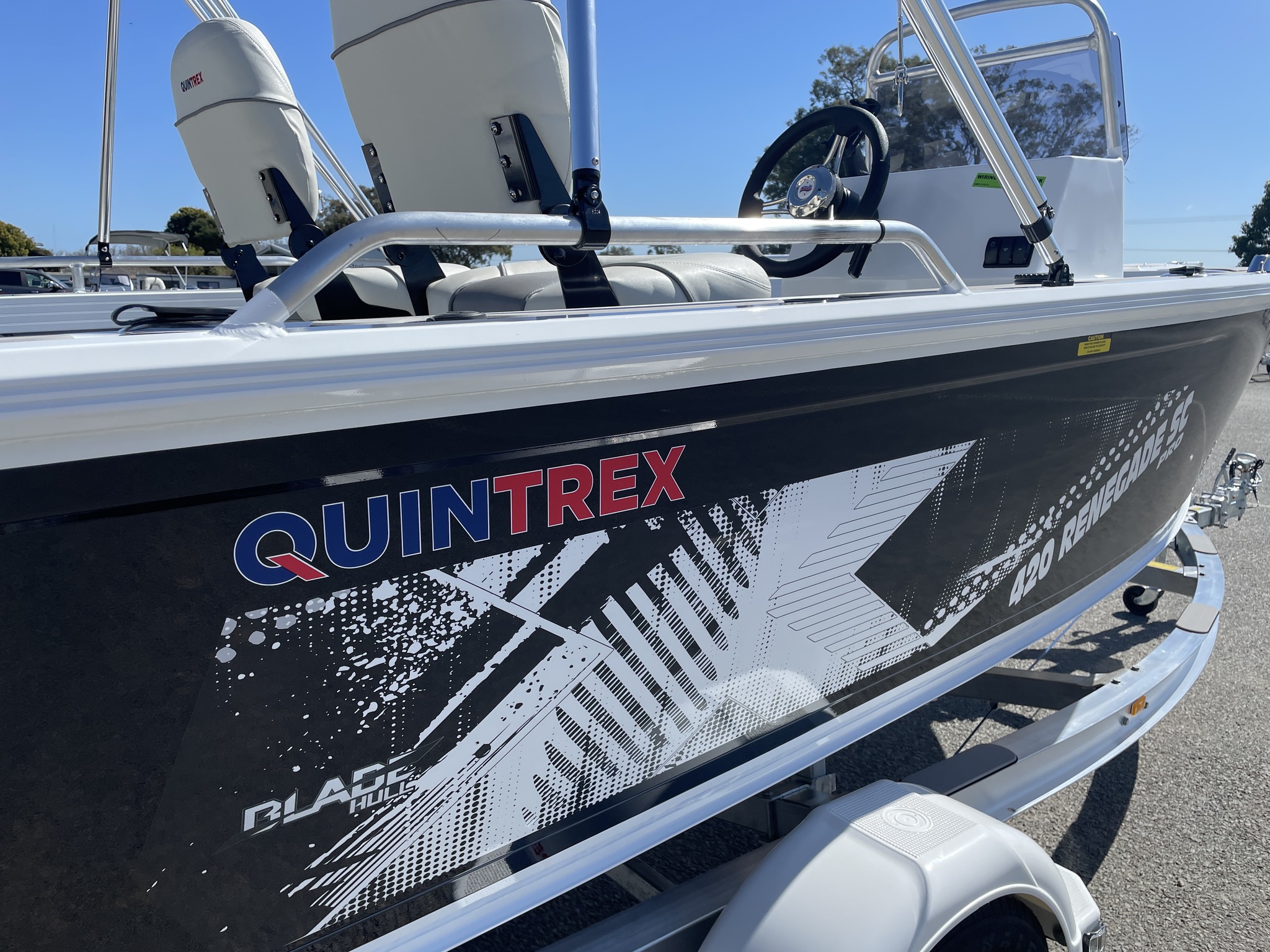 A close up of a Quintrex boat hull.