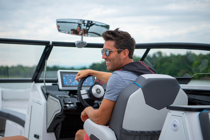 A man operating a boat.