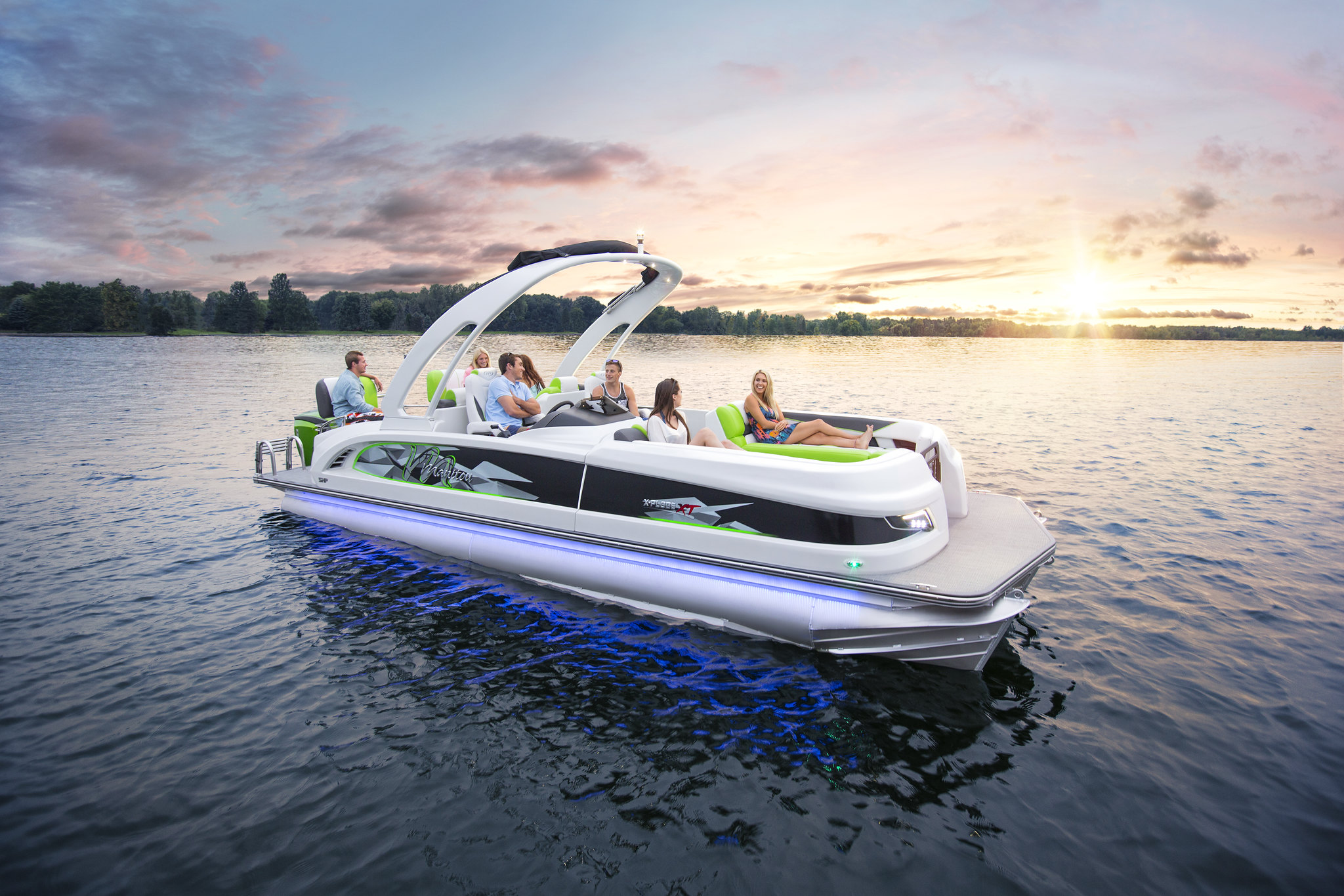 A group of people onboard a pontoon boat.