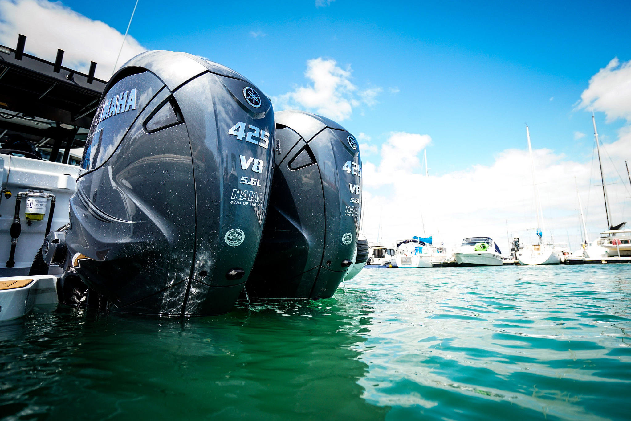 A pair of Yamaha outboards attached to a boat.