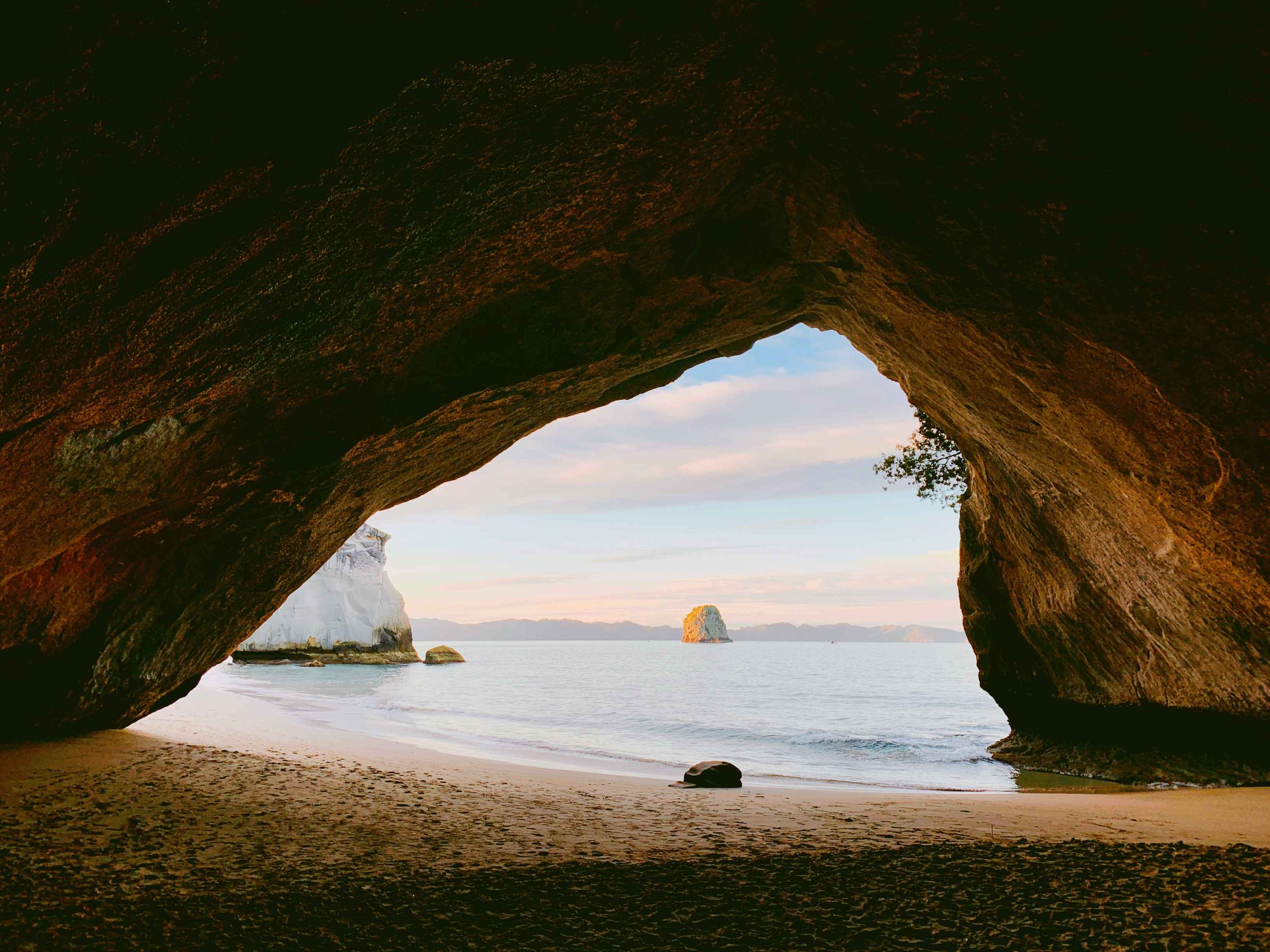 A wide shot inside a cove overlooking the beach.