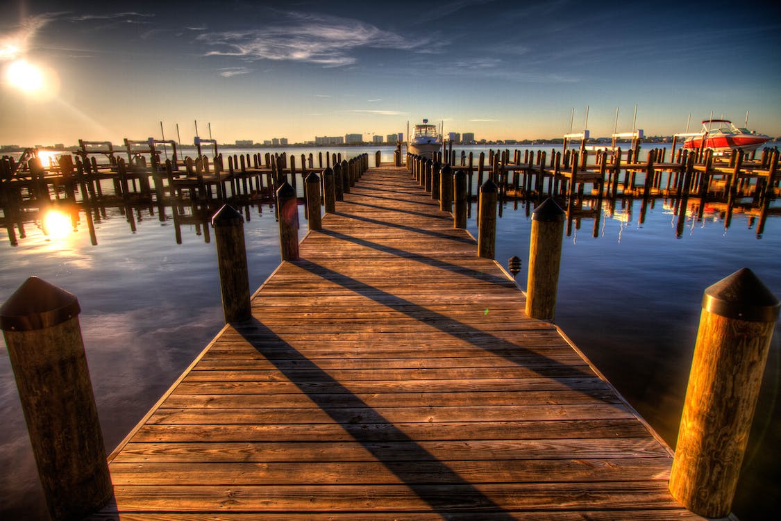 A close up image of a wooden boat dock