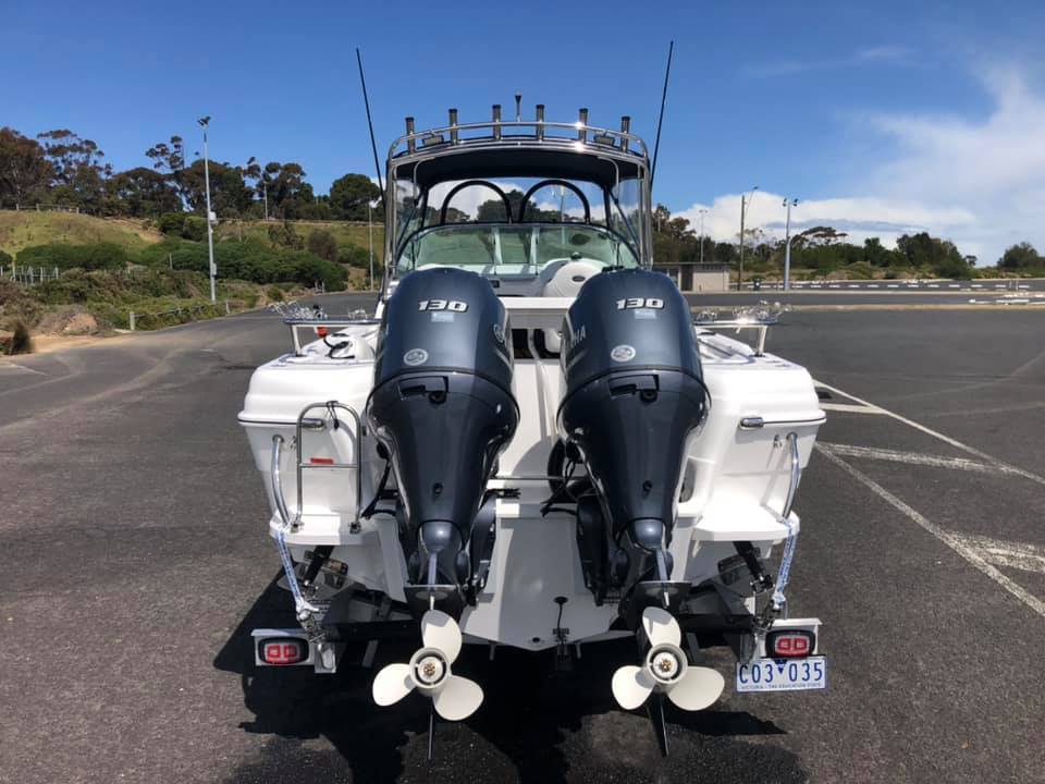 A boat with two Yamaha outboard engines attached to the transom