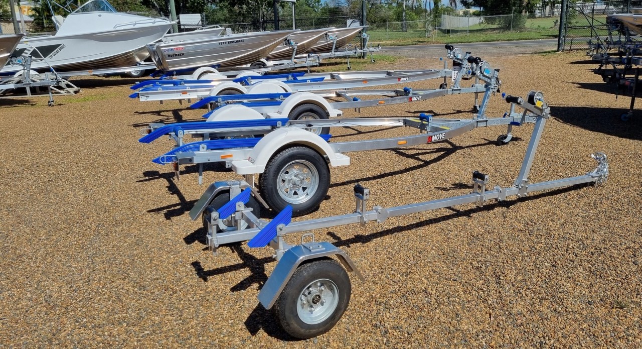 A row of Move Boat bunk boat trailers