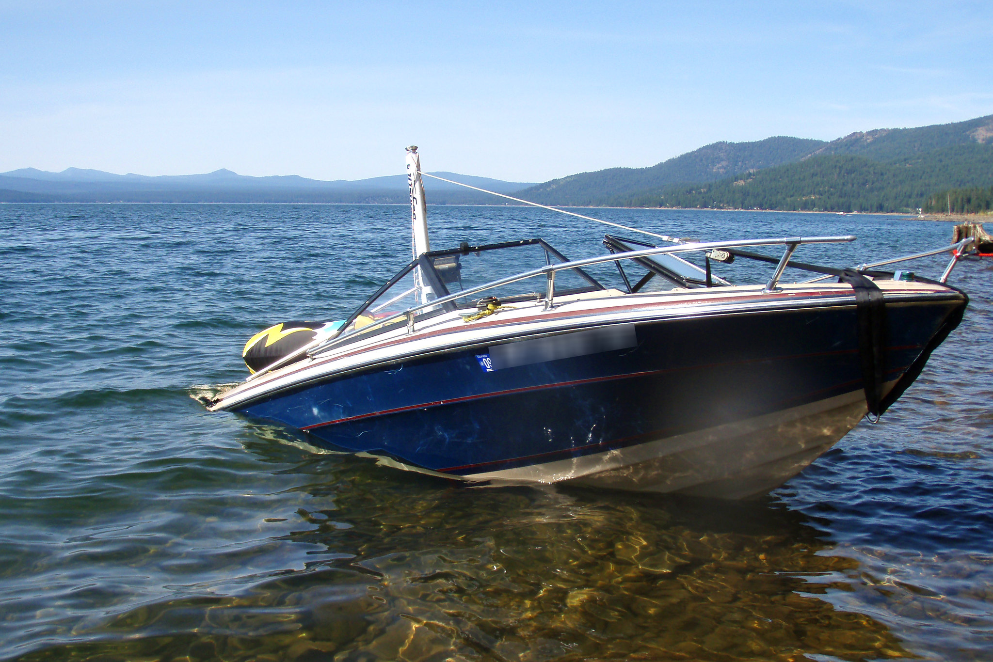 A sinking boat that has been involved in an accident.