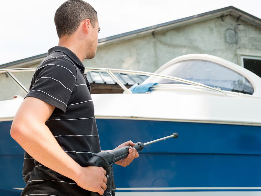 Man doing preventive maintenance to his boat