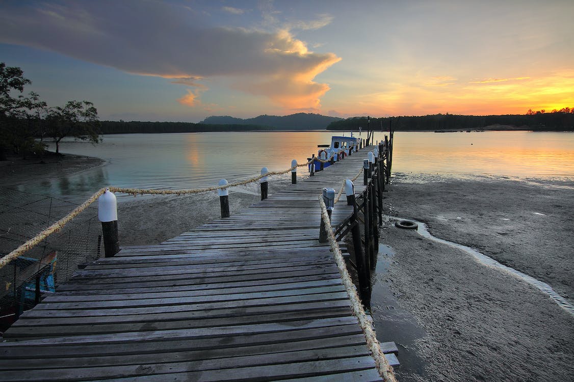 Boats moored to a dock