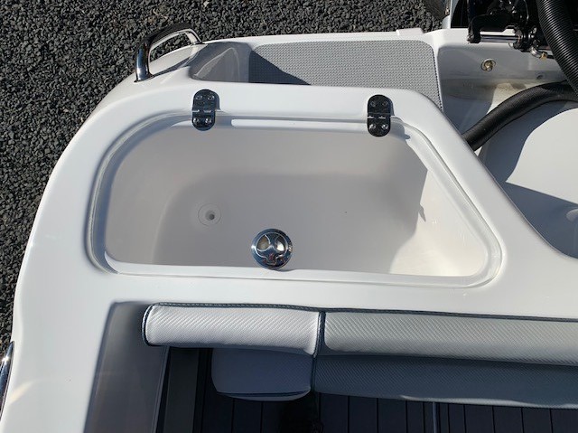 A close up view of a boat's livewell tank.