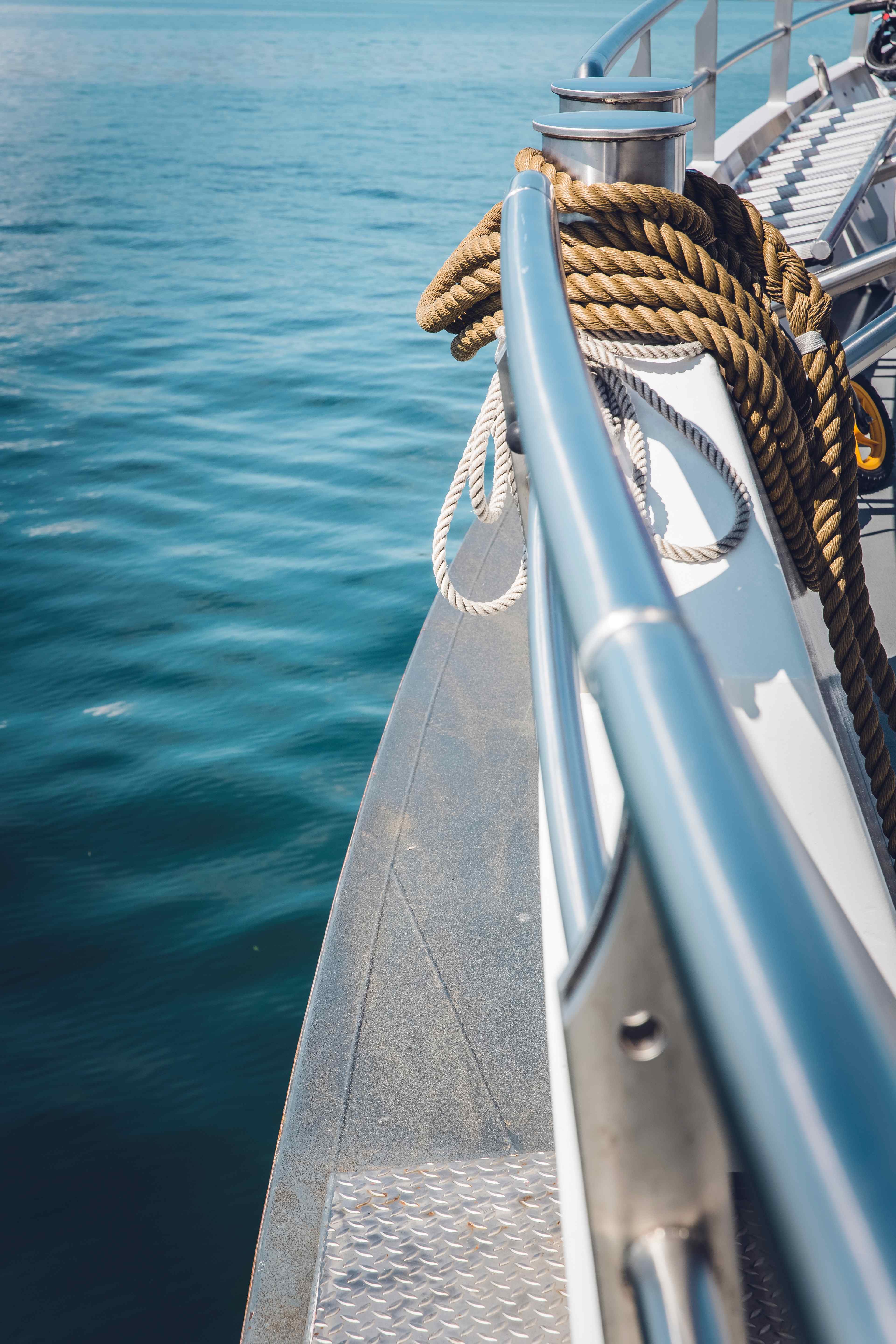 A close up shot of a polished boat's port.