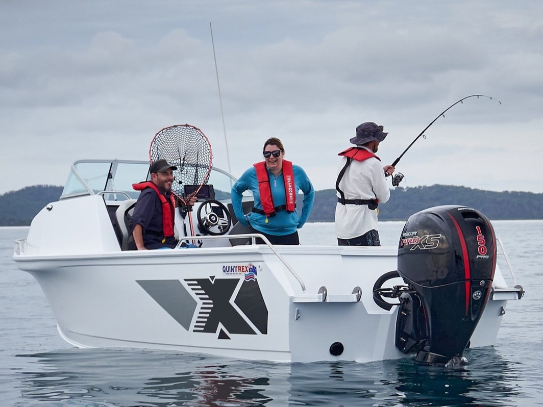 fishers fishing aboard on a quintrex boat
