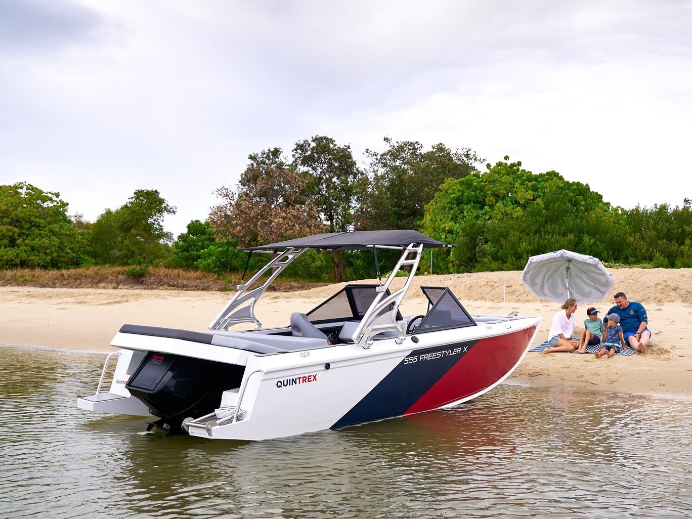 new quintrex boat beach on the shore