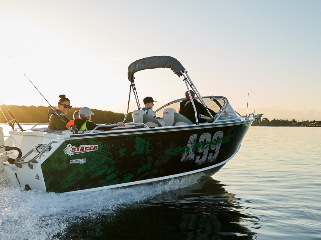 passengers on a Stacer Sea Master fishing boat